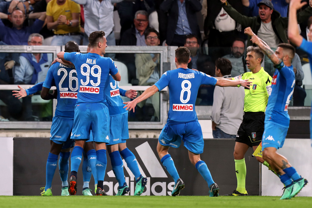 Kalidou Koulibaly and his Napoli team-mates celebrates last weekend's winner at Juventus.