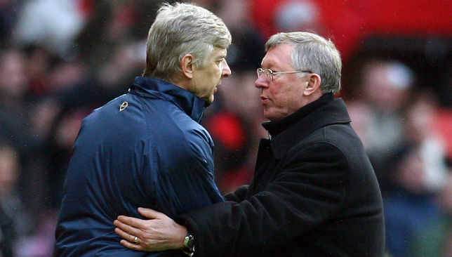 Sir Alex Ferguson (R) shakes hands with Arsenal manager Arsene Wenger
