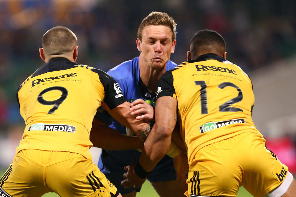 Out of their misery: Dane Haylett-Petty is smashed during the Force's final loss in the streak, to the Hurricanes in Perth - Game No28 in the streak.