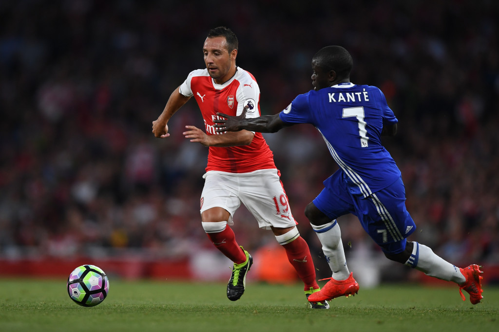 LONDON, ENGLAND - SEPTEMBER 24: Santi Cazorla of Arsenal (L) takes it past N'Golo Kante of Chelsea (R) during the Premier League match between Arsenal and Chelsea at the Emirates Stadium on September 24, 2016 in London, England. (Photo by Shaun Botterill/Getty Images)