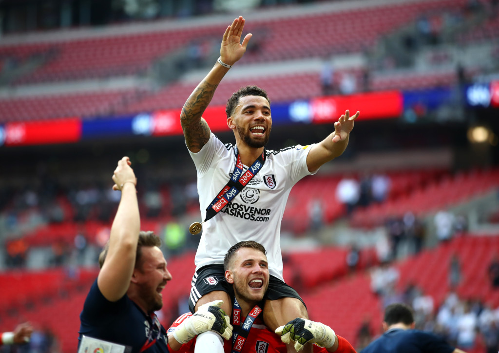 LONDON, ENGLAND - MAY 26: Ryan Fredericks of Fulham celebrates with Marcus Bettinelli of Fulham following their sides victory in the Sky Bet Championship Play Off Final between Aston Villa and Fulham at Wembley Stadium on May 26, 2018 in London, England. (Photo by Clive Mason/Getty Images)