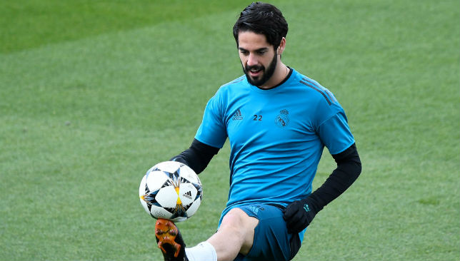 Isco takes part in a training session