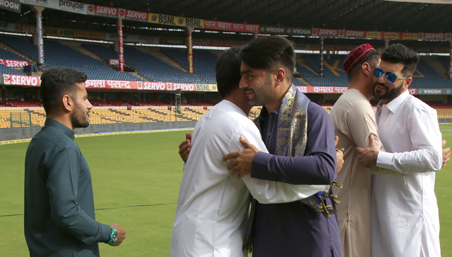 Rashid Khan greets his team-mates at the stadium. Picture: BCCI