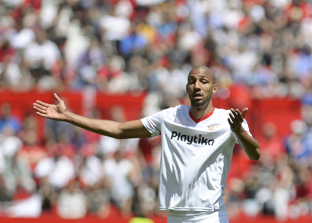 Sevilla's French midfielder Steven N'Zonzi gestures during the Spanish league footbal match between Sevilla FC and Villarreal CF at the Ramon Sanchez Pizjuan stadium in Sevilla on April 14, 2018. / AFP PHOTO / CRISTINA QUICLER (Photo credit should read CRISTINA QUICLER/AFP/Getty Images)