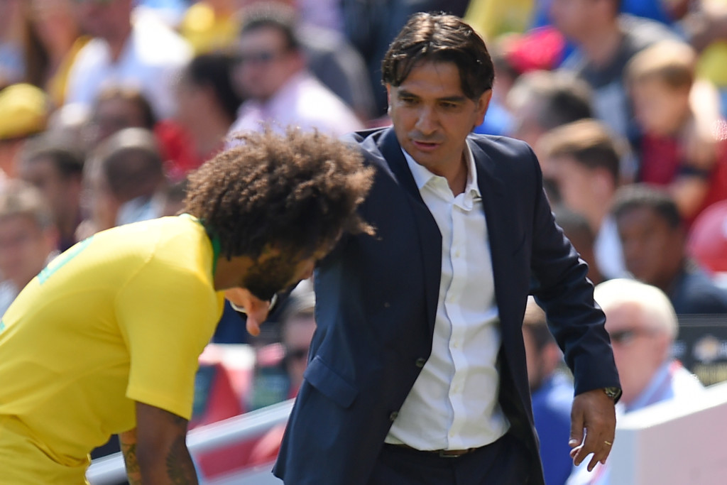 Croatia's manager Zlatko Dalic speaks with Brazil's defender Marcelo during the International friendly football match between Brazil and Croatia at Anfield in Liverpool on June 3, 2018. (Photo by Oli SCARFF / AFP) (Photo credit should read OLI SCARFF/AFP/Getty Images)