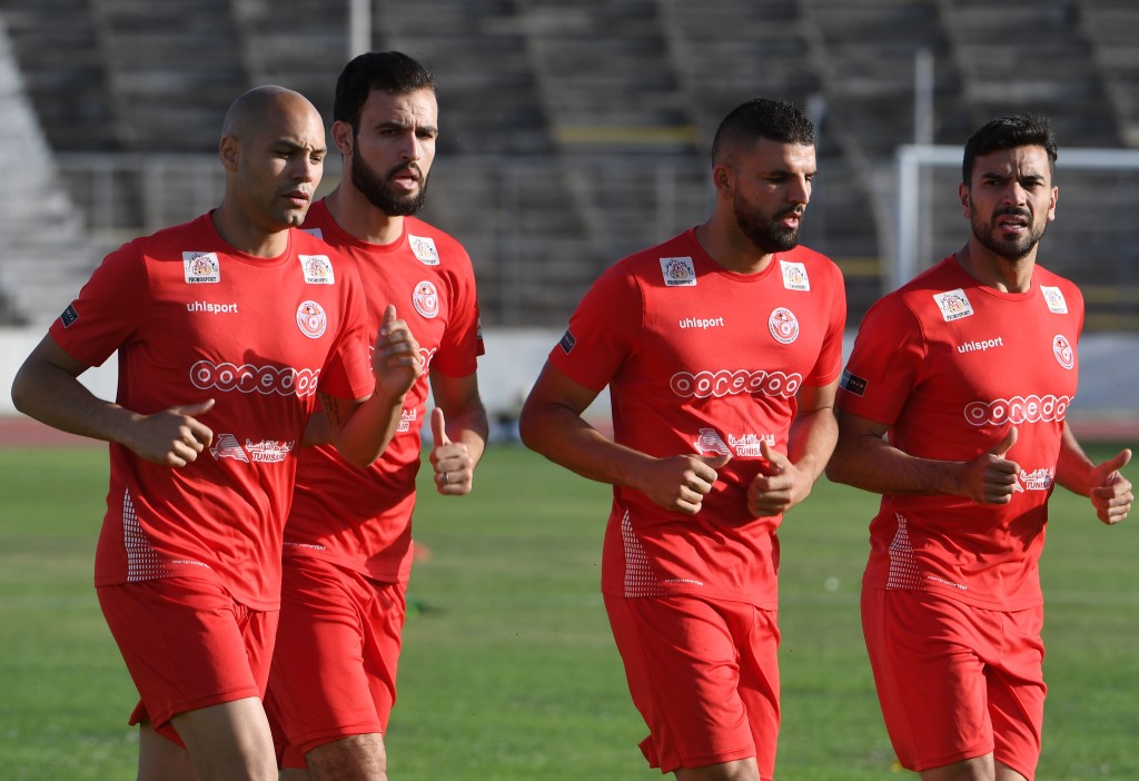 (L to R) Tunisia's defender Yohan Benalouane, defender Hamdi Nagguez, defender Syam Ben Youssef, and defender Oussama Haddadi take part in a training session at the Olympic stadium El Menzah in the Tunisian capital on June 4, 2018, as part of the team's preparation for the upcoming FIFA World Cup 2018 in Russia. (Photo by Fethi Belaid / AFP) (Photo credit should read FETHI BELAID/AFP/Getty Images)
