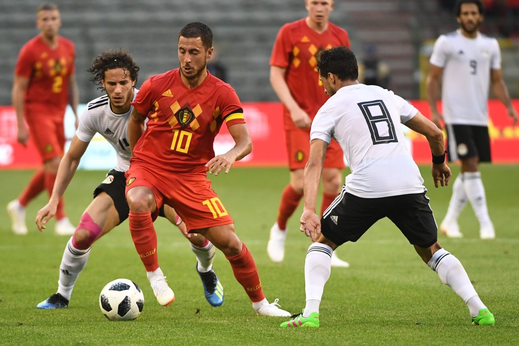 Belgium's forward Eden Hazard (C) vies for the ball with Egypt's midfielder Tarek Hamed (R) during the international friendly football match between Belgium and Egypt at the King Baudouin Stadium, in Brussels, on June 6, 2018. (Photo by EMMANUEL DUNAND / AFP) (Photo credit should read EMMANUEL DUNAND/AFP/Getty Images)