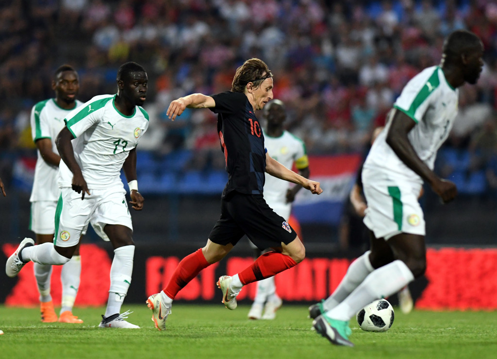 Croatia's midfielder Luka Modric runs with the ball during friendly football match between Croatia and Senegal at Gradski Stadium in Osijek on June 8, 2018. (Photo by Denis Lovrovic / AFP) (Photo credit should read DENIS LOVROVIC/AFP/Getty Images)