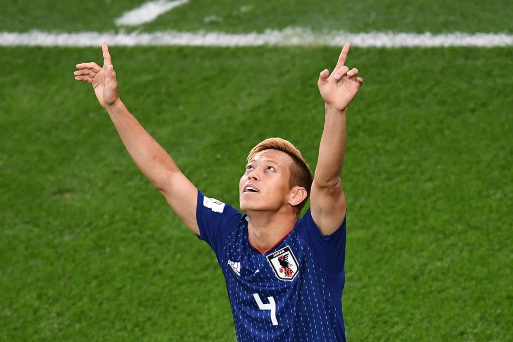 Japan's midfielder Keisuke Honda celebrates a goal during the Russia 2018 World Cup Group H football match between Japan and Senegal at the Ekaterinburg Arena in Ekaterinburg on June 24, 2018. (Photo by Anne-Christine POUJOULAT / AFP) / RESTRICTED TO EDITORIAL USE - NO MOBILE PUSH ALERTS/DOWNLOADS (Photo credit should read ANNE-CHRISTINE POUJOULAT/AFP/Getty Images)