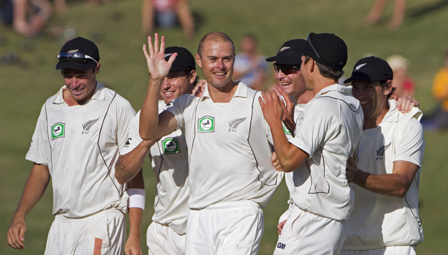 New Zealand's Chris Martin (C) celebrates with his team-mates
