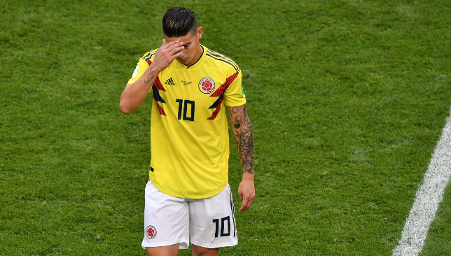Tears: James Rodriguez limped off against Senegal.