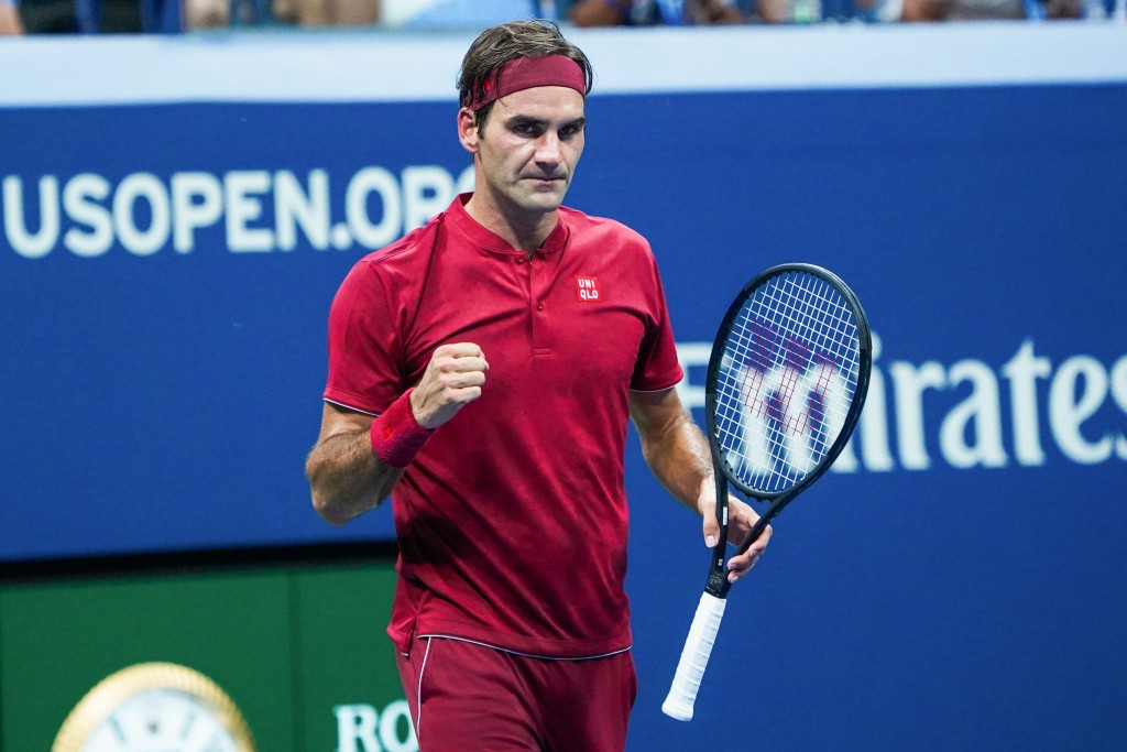 Roger Federer of Switzerland celebrates after defeating Yoshihito Nishioka of Japan (off frame) during their 2018 US Open men's match August 28, 2018 in New York. (Photo by EDUARDO MUNOZ ALVAREZ / AFP) (Photo credit should read EDUARDO MUNOZ ALVAREZ/AFP/Getty Images)