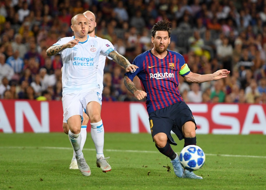 Lionel Messi of Barcelona scores his team's third goal.