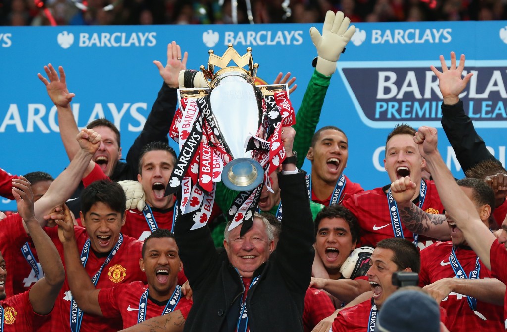MANCHESTER, ENGLAND - MAY 12: Manchester United Manager Sir Alex Ferguson lifts the Premier League trophy following the Barclays Premier League match between Manchester United and Swansea City at Old Trafford on May 12, 2013 in Manchester, England. (Photo by Alex Livesey/Getty Images)