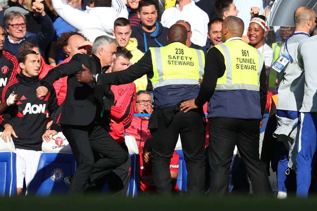 Stewards hold back Jose Mourinho