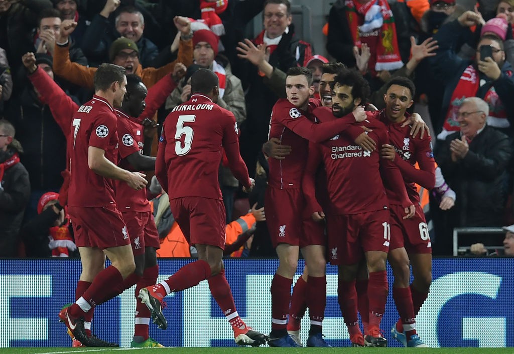 Liverpool players celebrate Salah's winner 