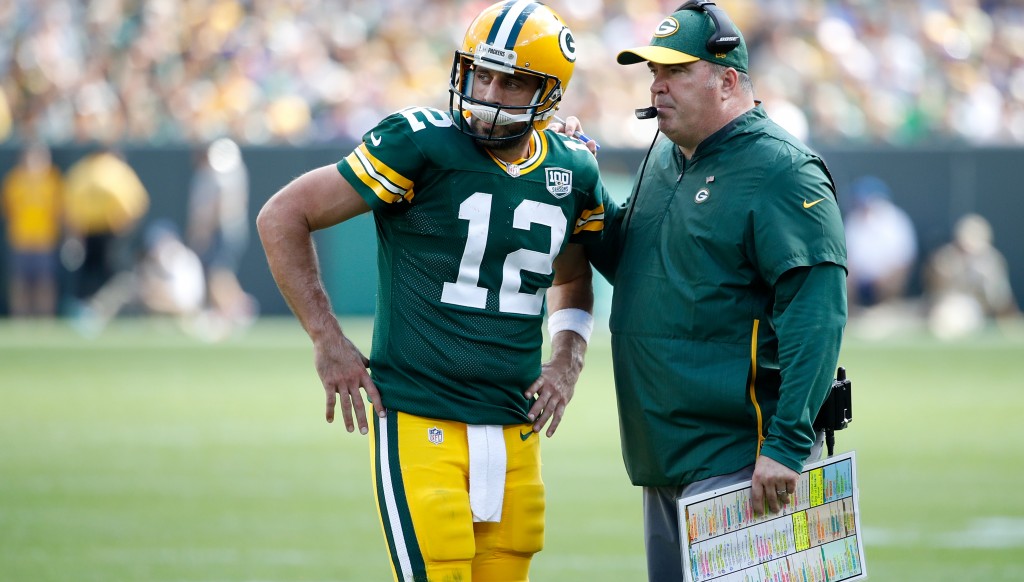 Mick McCarthy (r) has been fired by the Green Bay Packers.