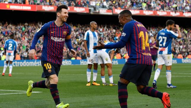 Lionel Messi celebrates his second with Malcom