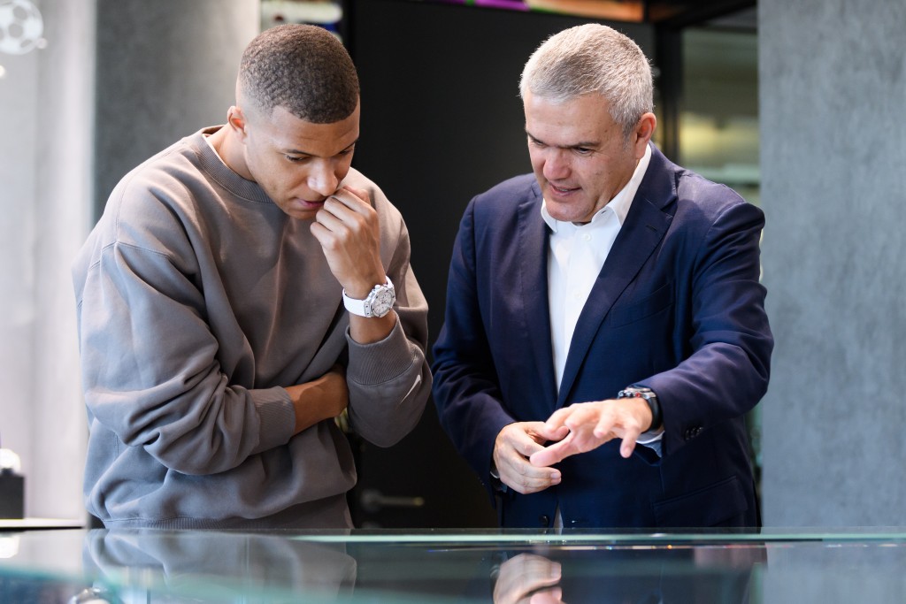 A meeting of minds: Kylian Mbappé chats with CEO Ricardo Guadalupe